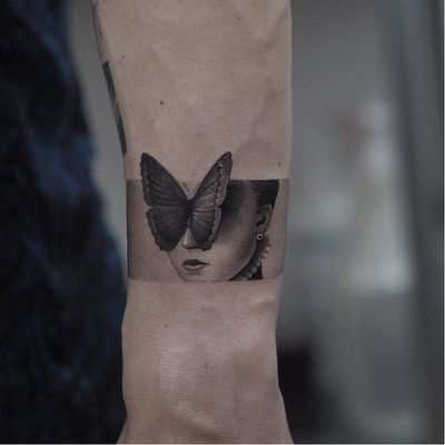 Butterfly tattoo by Jefree Naderali #JefreeNaderali #butterflytattoo #butterflytattoos #butterfly #moth #wings #insect #nature #realism #realistic #blackandgrey #lady #portrait #surreal #arm