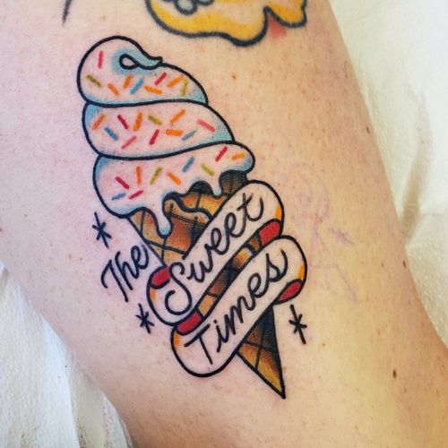 Traditional ice cream waffle cone with sprinkles, lettering and banner