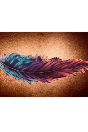 I might cover up my lower back tatt with this (I superimposed the feather over my actual tattoo)