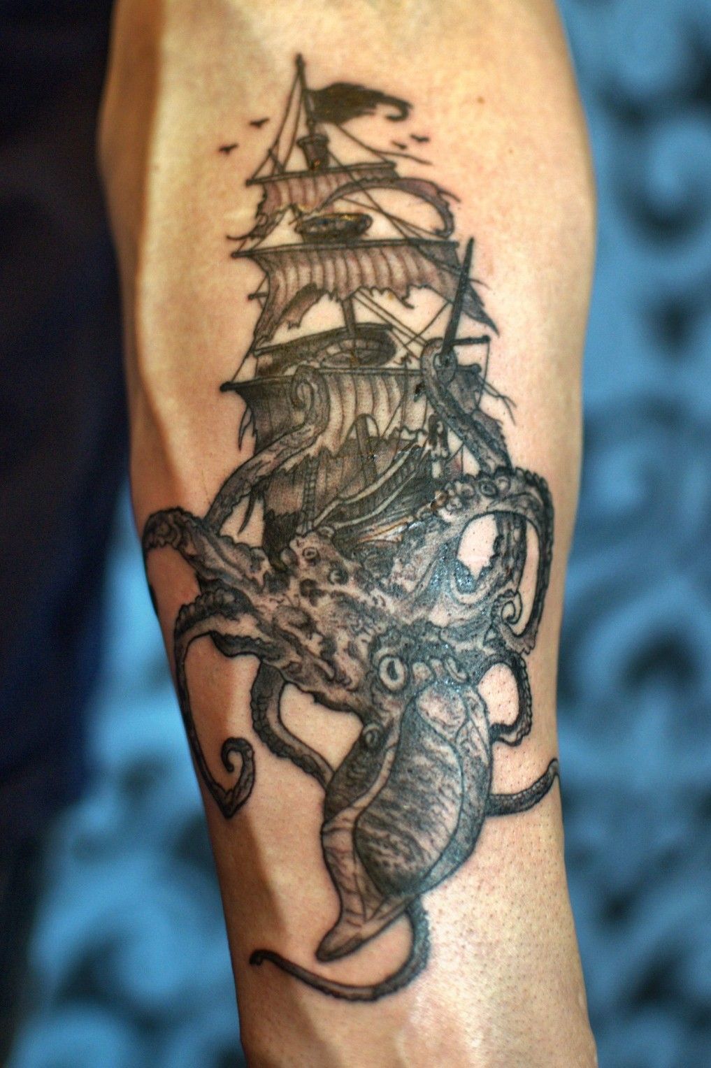 Illustrative style Sailing ship and Kraken tattoo on
