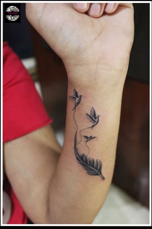 Feather and birds - freedom tattoo at OUCHFor bookings call 7382521886, 9848597806.