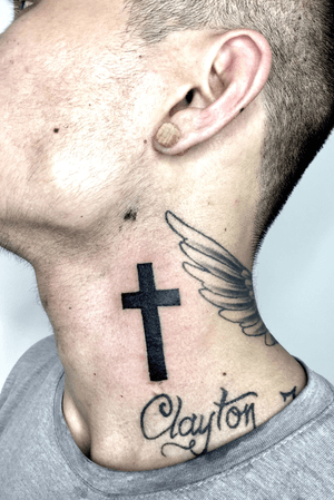 Blackwork tattoo on neck