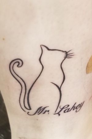 #9Tattoo You 28 MinnesotaGrand Casino Hinckley August 24th, 2019 I just had to get an outline of my little house tiger. It is a legit outline (except his tail, I added that. Haha.) of him sitting in the window. Thank you, Lynn, for doing this for me! I love it! 
