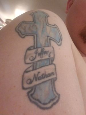 Celtic cross with kids names, a few years old
