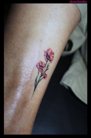 Floral tattoo at OUCH.                                                     For bookings call at 7382521886, 9848597806
