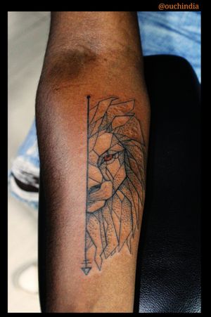 Geometric lion tattoo at OUCH.                                                                   For bookings call at 7382521886, 9848597806