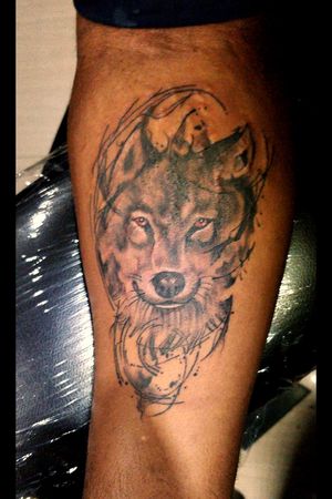 Wolf tattoo at OUCH. For bookings call at 7382521886, 9848597806