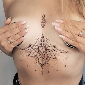 Cavellucci Tattoo - Underboob piece. Simple and sharp. #dotworktattoo  #tattooartmagazine #finelinework #queenofheartstattoo #tattoomodel # underboob #tattoo #ink #inkpration #mandalatattoo #ornamentaltattoo