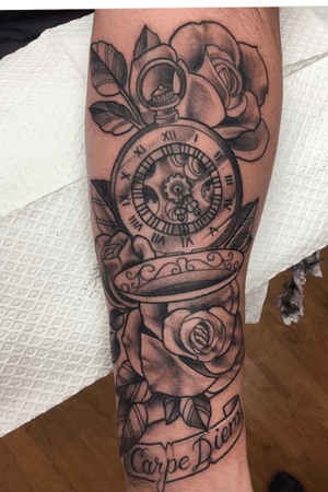 Pocket watch and roses