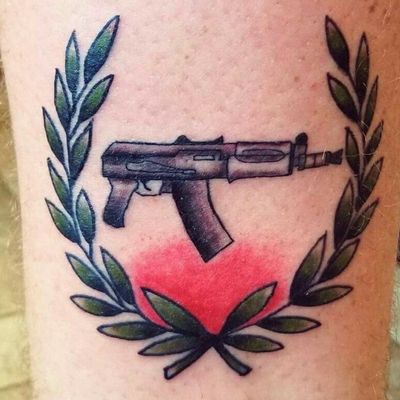 AK-74 with olive branch. #ak47 #ak74 #ak47tattoo #Aktattoos #olivebranch #peaceandwar #revolution #2ndamendment #kalashnikovtattoo #kalashnikov #gun #guntattoo 