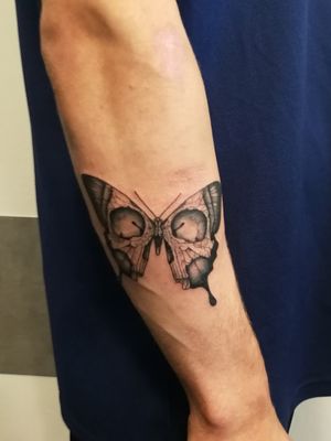 Butterfly-skull black work
