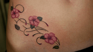 Ornemental on the side of the stomach design and tattoo by Laetitia 