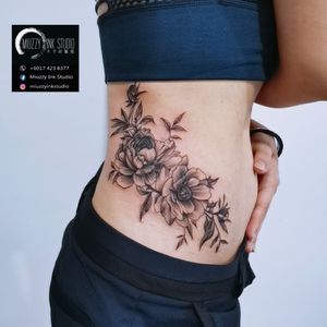 Floral side tattoo