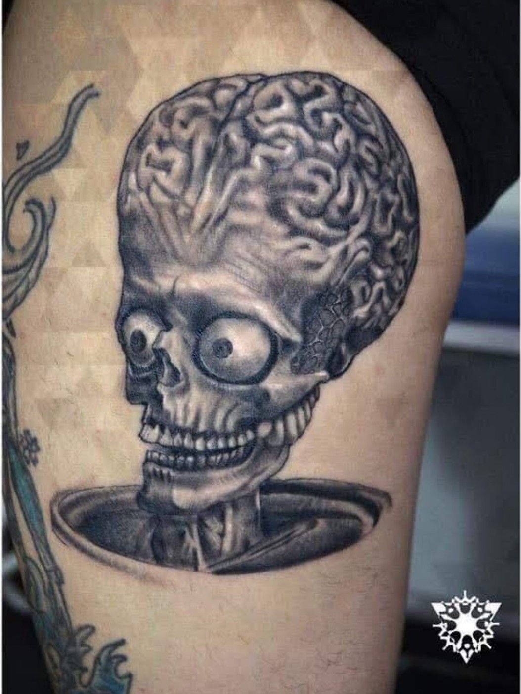 Mars Attacks inspired tattoo on the left thigh