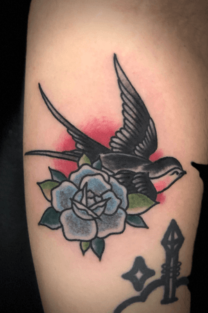 Traditional Rose and Swallow Tattoo on the Forearm