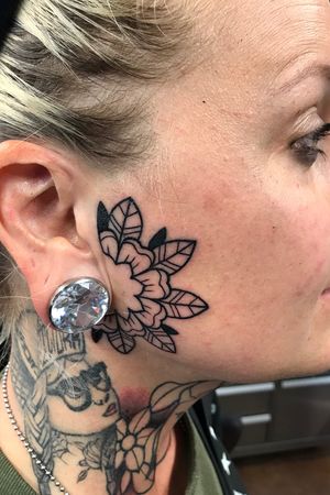 Decorative little face tattoo #face #flower #geometric #blackwork #denver 