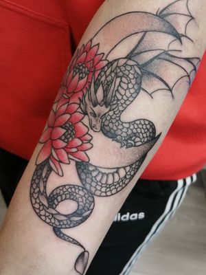 Dragon tattoo with moon and lotus flowers
