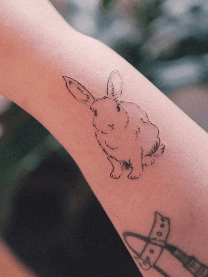 Hand drawn of rabbit traditional tattoo outline Vector Image
