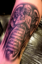 Praying Angel memorial piece done on the outer calf...