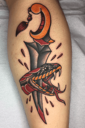 Traditional snake and dagger tattoo 
