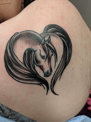 Same horse tattoo, just added a bit of a touch-up. Done by Ben Alexander at Ink Monkey in Guntersvillle Alabama.