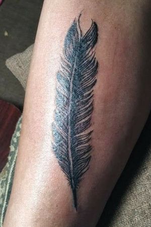 Mom' first tattoo, feather
