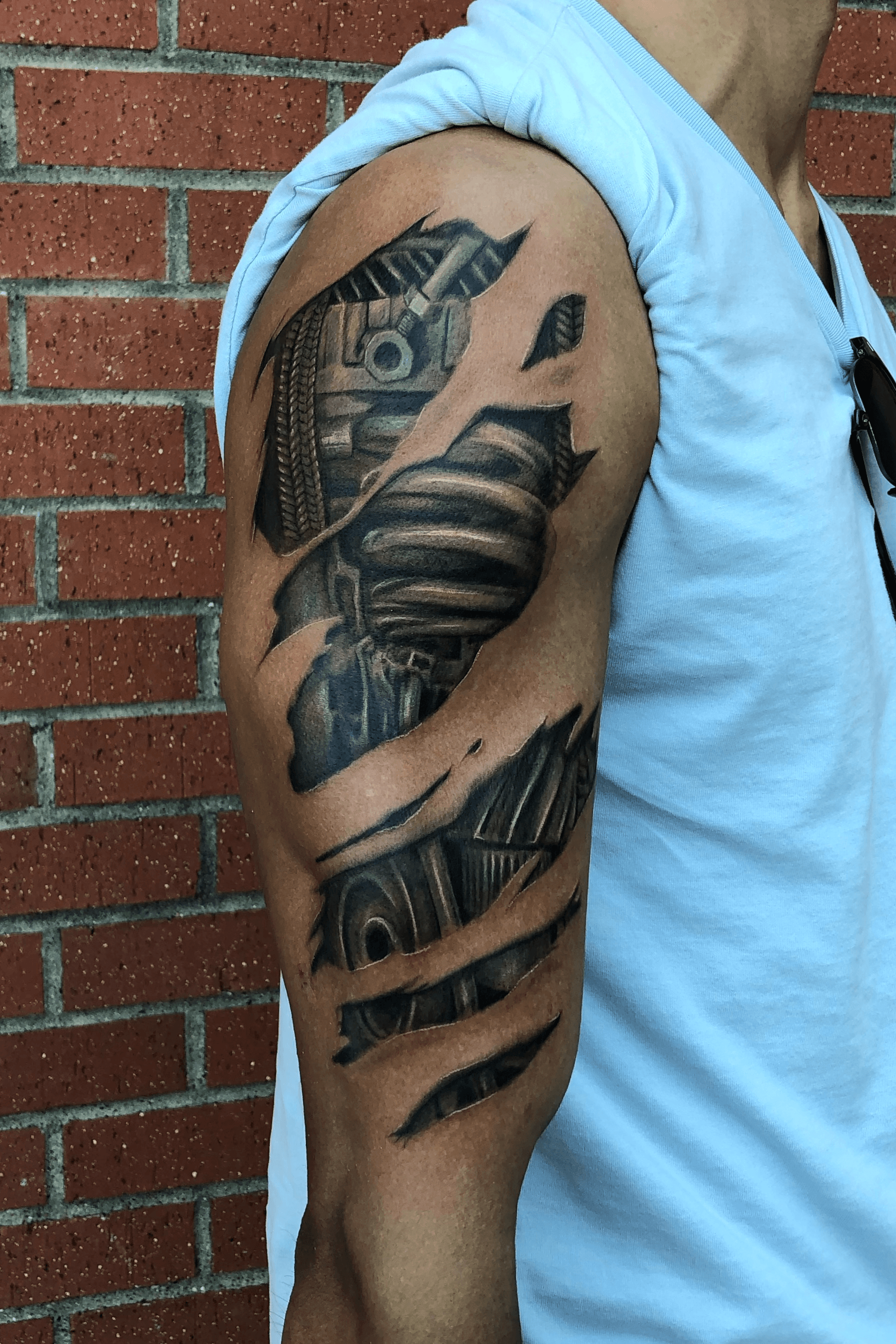 Ripped Skin Barbed Wire Tattoo On Half Sleeve