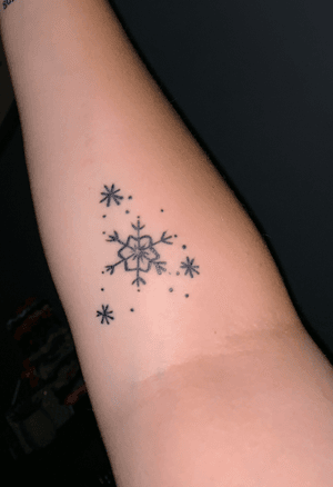 snowflakes on arm before elbow