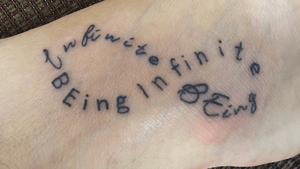 Foot tattoo of infinity words