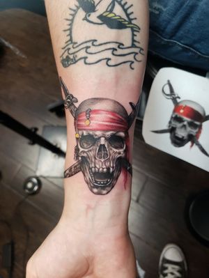Mani did an amazing job helping me customize this piece, it's a play on the Pirates of the Caribbean logo and he knocked it out in 2 1/2 hours. Hyper realism. It was 300$ and worth it. Dark ages tattoos has won so many awards nationwide and in the state of Texas. Worth the visit. 