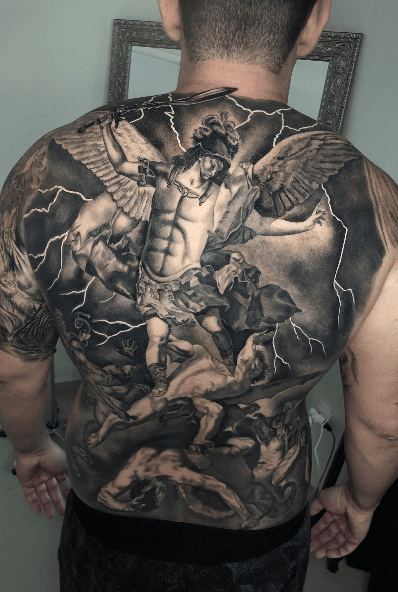Realistic Colored Angel Vs Evil Tattoo On Right Shoulder
