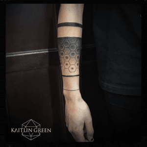 Hexagon armband, blackwork, band tattoo, dotwork, geometric tattoo for women done by female tattoo artist Kaitlin Green in Denver Colorado. 