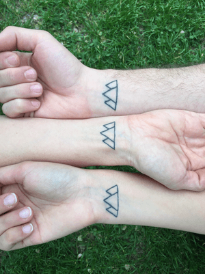 Family tattoo with my mom and brother. A big center triangle and two little one by the side. 
