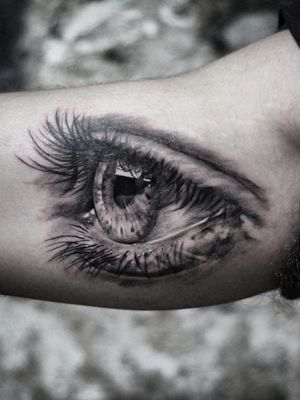Black and grey Hyperrealistic Eye Tattoo 