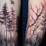 black and grey freehanded tree tattoo on sleeve