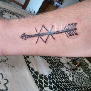 First tattoo ~ Inguz symbol with an arrow ~ Black and Grey
