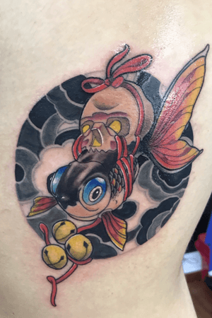 Tattoo fish and skull 