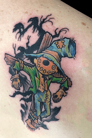Custom scarecrow design by Andre for appointments contact the studio