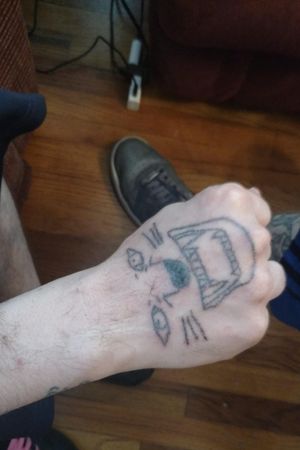 What my friend had on his hand before i covered it up with flowers.