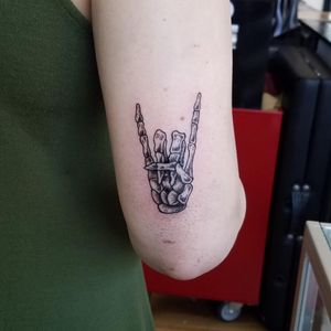 Rock and roll skeleton hand for Karina! She has been waiting to get this for awhile now! Glad to make it come true #syfitattoos #blackandgrey #skeleton #bones #dotwork #traditional #cool #rockandroll #simple #brooklyn #nyc