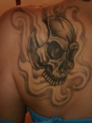 Franklin Ward is the best.....I asked for a skull that's not girly with no color and badass!!! I so got what I asked for..... So going back to him to get a female style on my right side. 
