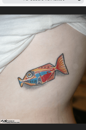 A babelfish (from The Hitchhiker’s Guide to the Galaxy) by  Jamie Clinton at Pino Bros Ink in Cambridge, MA. #fish #babblefish #sciencefiction #hitchhikersguide #colour #jamieclinton #pinobrosink 