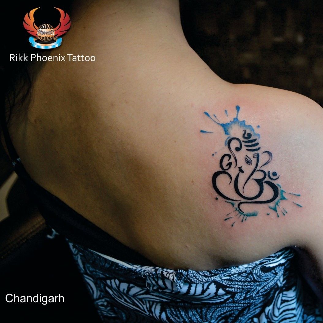 ganesh om symbol tattoo