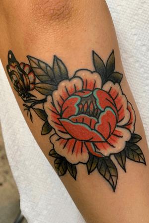 Traditional peony and butterfly tattoo