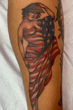 Traditional pinup girl wrapped in a american flag 