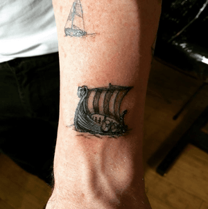 Viking ship and sail boat designed and performed by Gary at Vivid Tattoo San Diego, CA