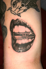 Bite the bullet tattoo 