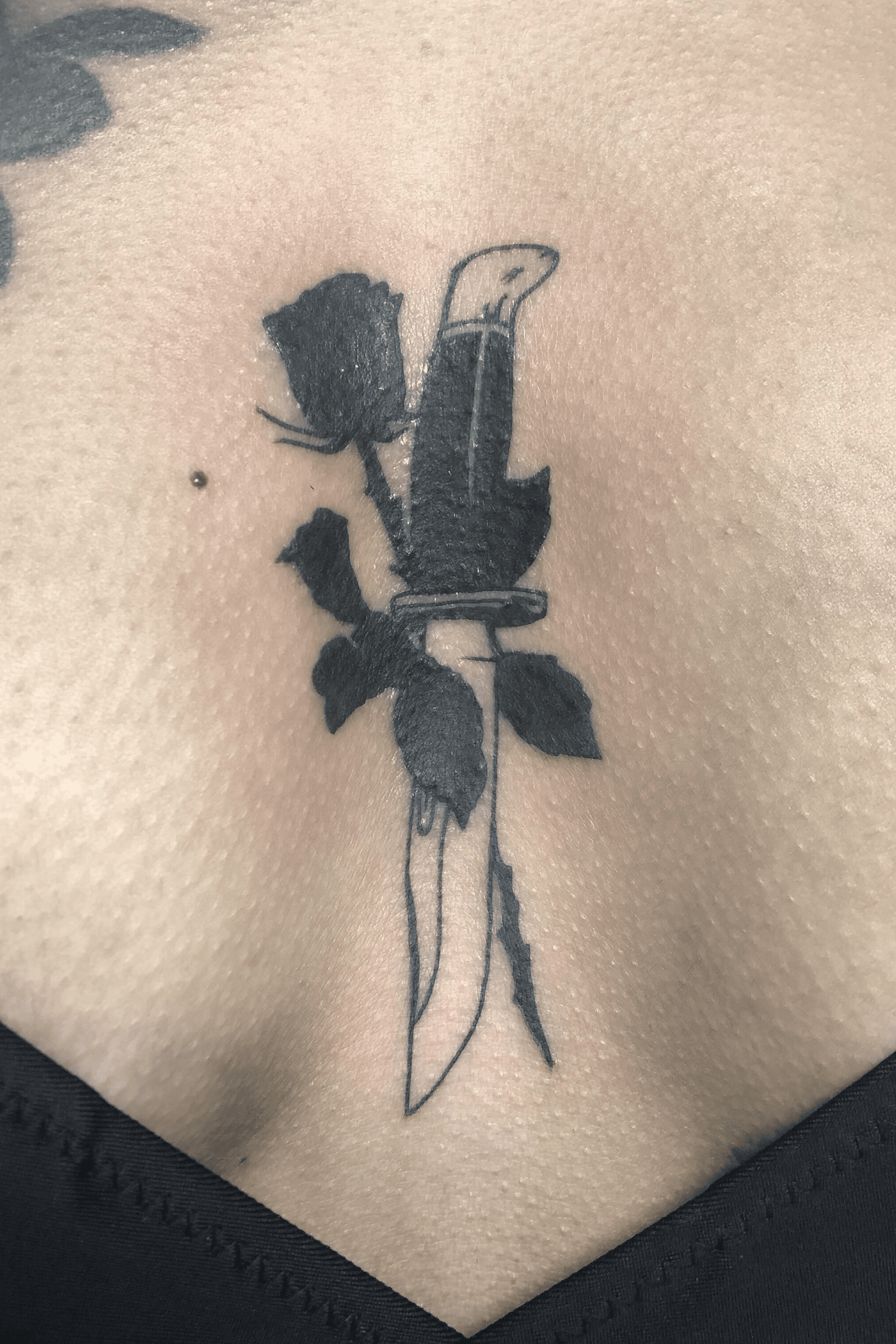 Small Dagger and Rose on Chest  Best Tattoo Ideas Gallery