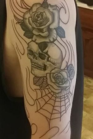 This is the 2 roses and a skull with an outline in progress around it
