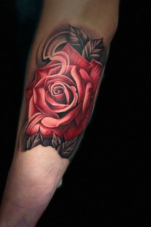 Sleeve in progress . Two roses , first one down ! One more to go , this was the first sitting , bottom portion of the sleeve is another rose to be completed in Oct. this first sitting was about 6.5 hours . Charging hourly rate . Usual consultations set up prior to booking an appointment. Specializing in custom realistic roses . Books open for January 2019